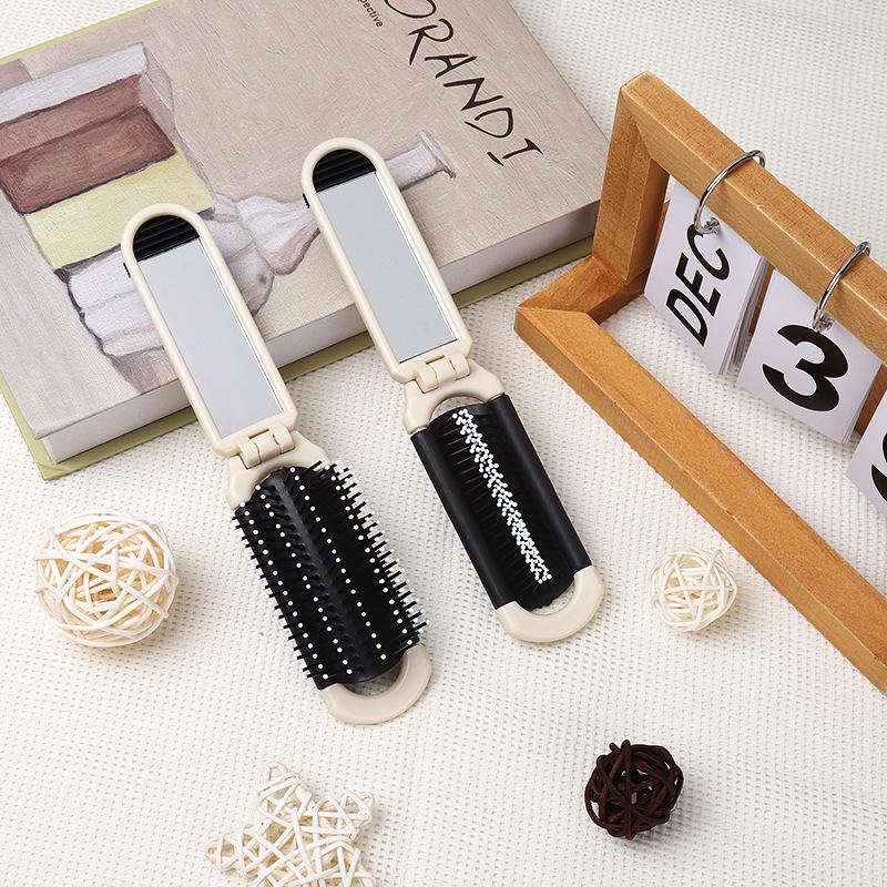 

Зеркало складное два-в-одном Off-White и съемная расческа для портативной парикмахерской и макияжа. 11*4*1 cm