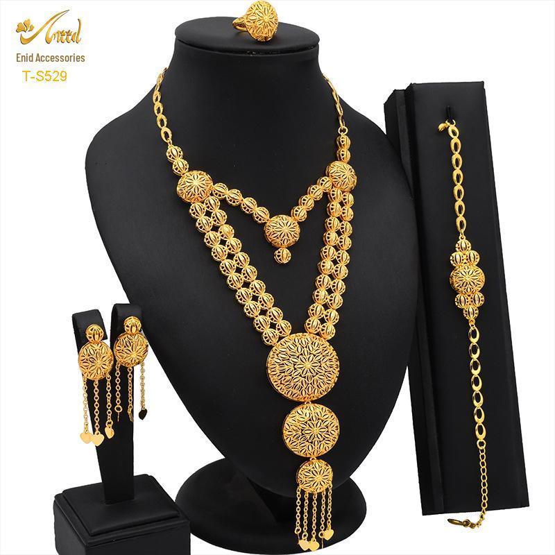 

Дубайский ювелирный набор из 24-каратного золота: Свадебное колье, браслет, серьги, кольцо - Коллекция «Арабская невеста»