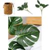 Künstliche Monstera Deliciosa Liebm Blattpflanze für Wohnzimmerdekoration mit handgeflochtenem Seegraskorb