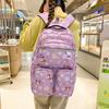 Stylish small fresh printed student backpack trendy cute lightweight backpack junior high school large capacity schoolbag