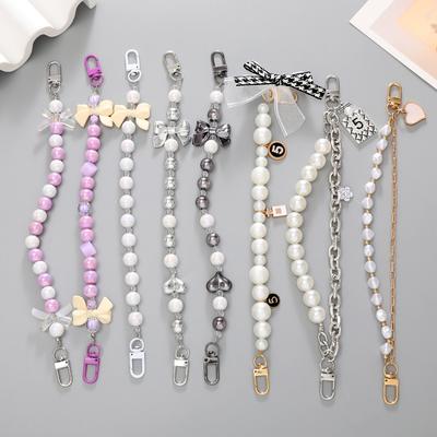 Příslušenství k mobilům – Řemínky na telefony a klíčenky