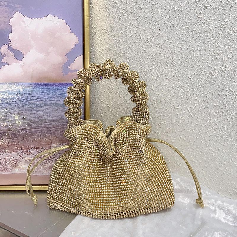 sense, trend, personality, light luxury, dumpling bag, niche design, shiny and inflexible, diamond-encrusted handbag.