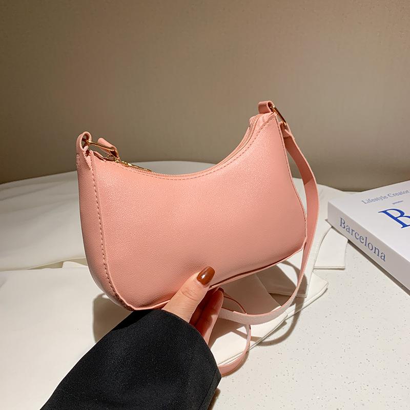 Eine modische DAMEN Tasche Unterarmtasche