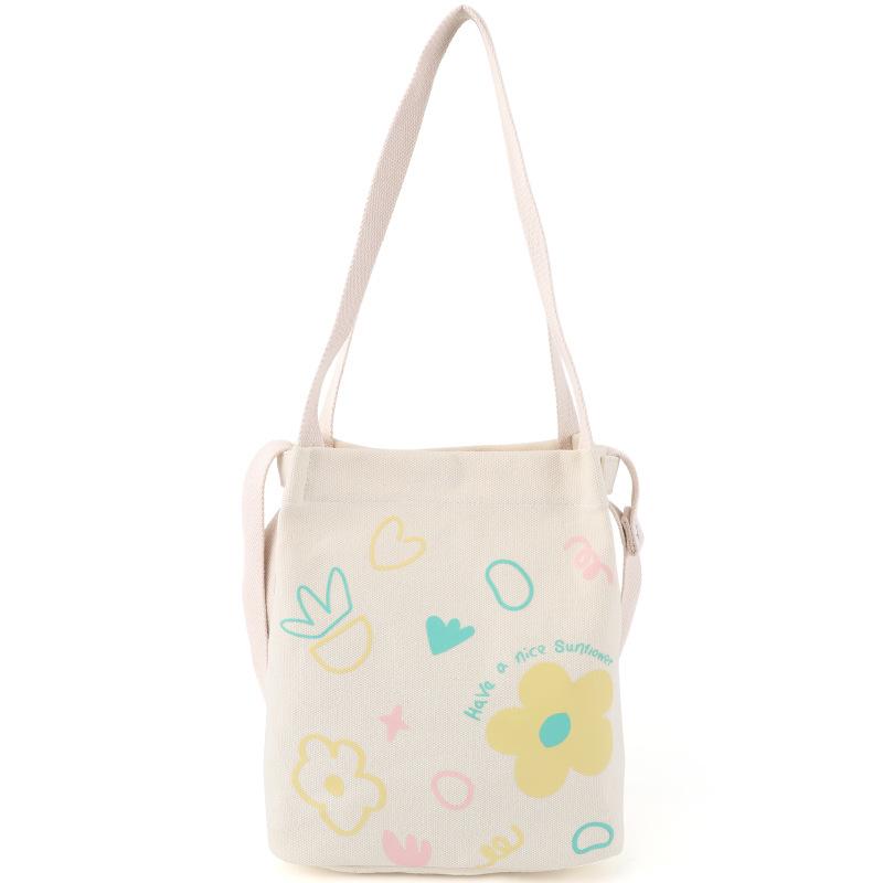 

Canvas bag women s leisure spring and summer new printed shoulder bucket bag ins crossbody cloth bag spot light