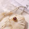 Hepburn-Style Heart Zircon Pendant Necklace: Gold-Plated Titanium, Imitation Pearl Design