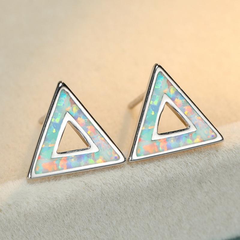 

Simple and stylish platinum blue and white hollow triangle women s versatile stud earrings