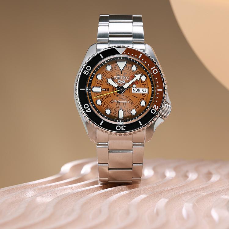 Seiko SEIKO5 Mechanisches Uhrwerk Edelstahlarmband Uhr Herrenuhren Orange Zifferblatt SRPJ47K1