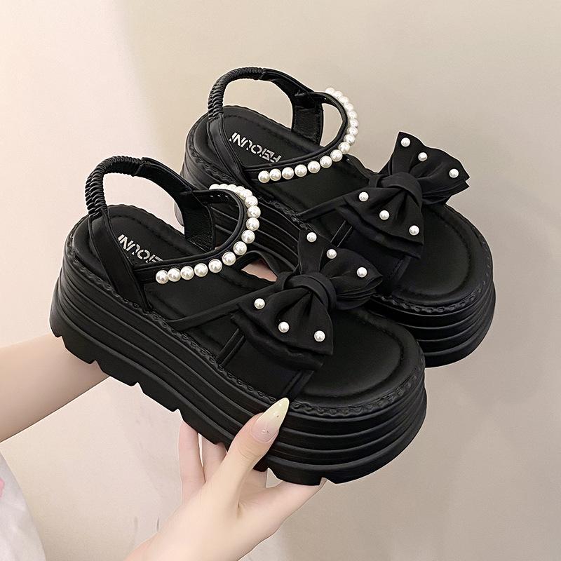 Platform bow sandals female popular summer new Korean version fairy wind pearl one-word buckle with muffin beach sandals
