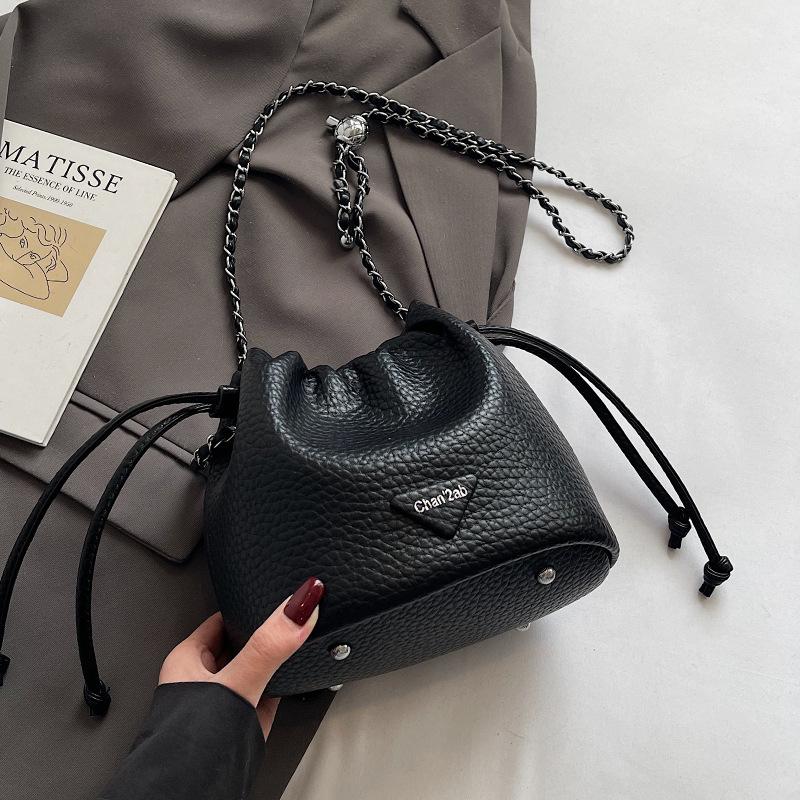 Popular wholesale high-quality lychee pattern temperament drawstring bucket bag versatile commuter simple light luxury chain messenger bag