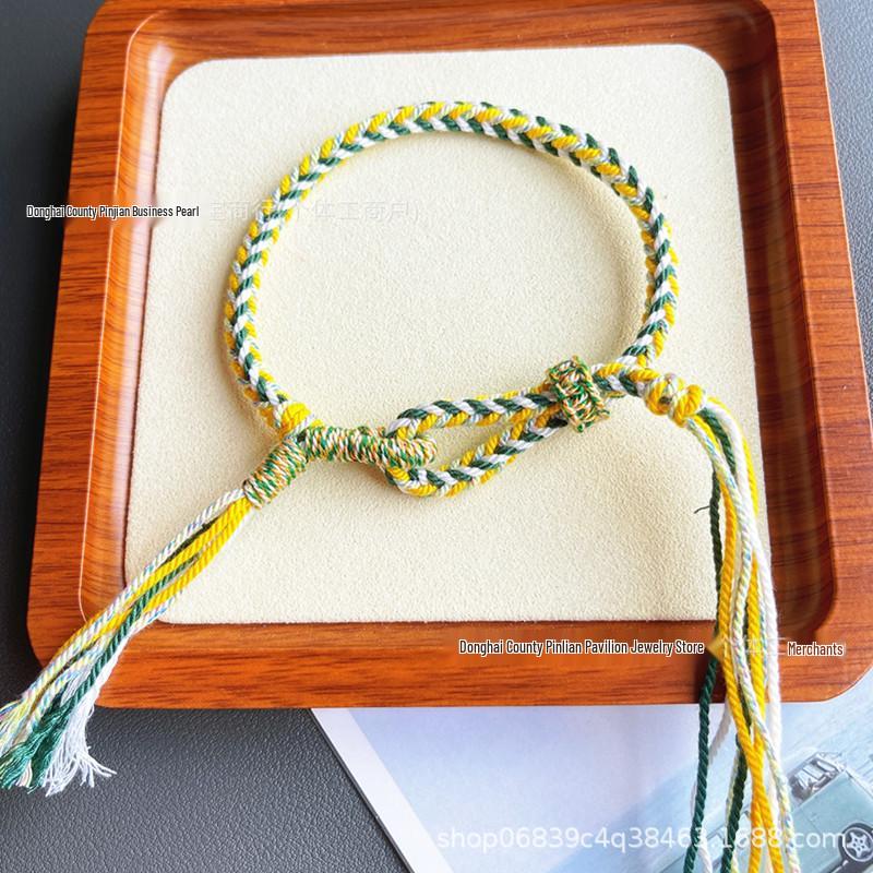Tibetan Wealth Gods Handmade Eight-Strand Braided Bracelet with Green Tara Thangka