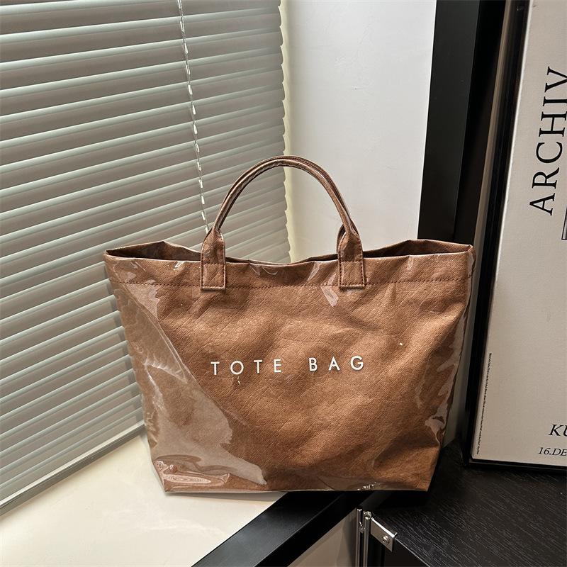 Large capacity DuPont paper jelly bag fashionable transparent pvc waterproof hand bag children kraft paper commuter hand