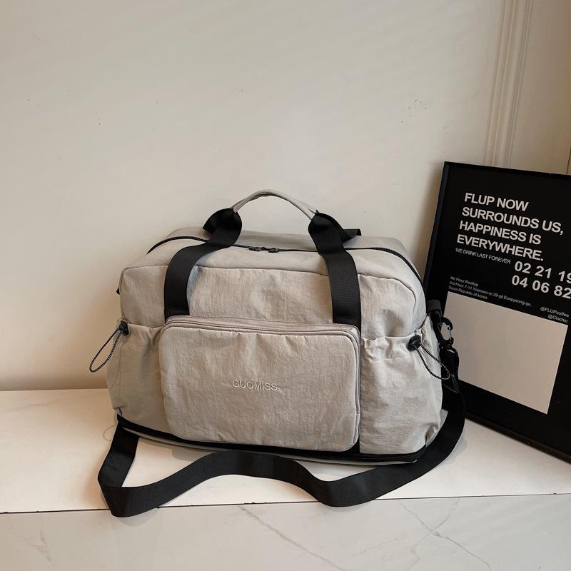 Travel bag Large capacity women's extendable portable storage bag Light commuter luggage bag Outdoor sports fitness bag