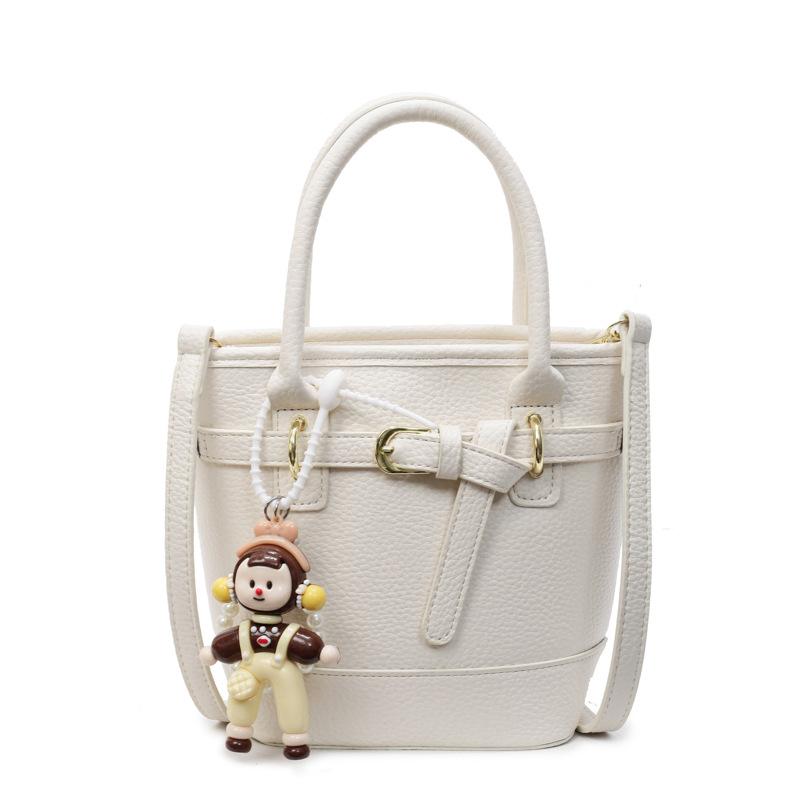 Hot sale in spring and summer Korean simple lychee pattern texture portable bucket bag casual commuting versatile solid color messenger women's bag