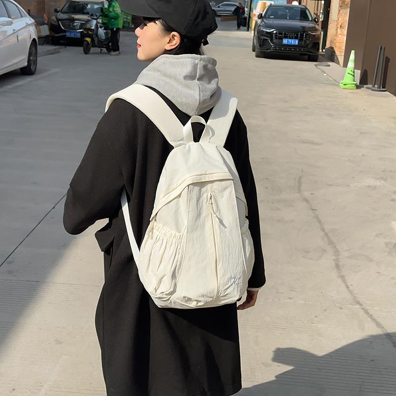 Japanese casual art canvas backpack ins simple fold wash water women's schoolbag Internet celebrity fashion nylon backpack