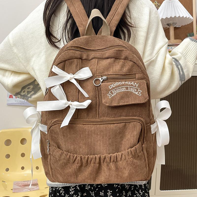 

ins ветряной бант рюкзак лента ученики средней школы ученики начальной школы повседневный универсальный рюкзак женский нишевый рюкзак коричневый