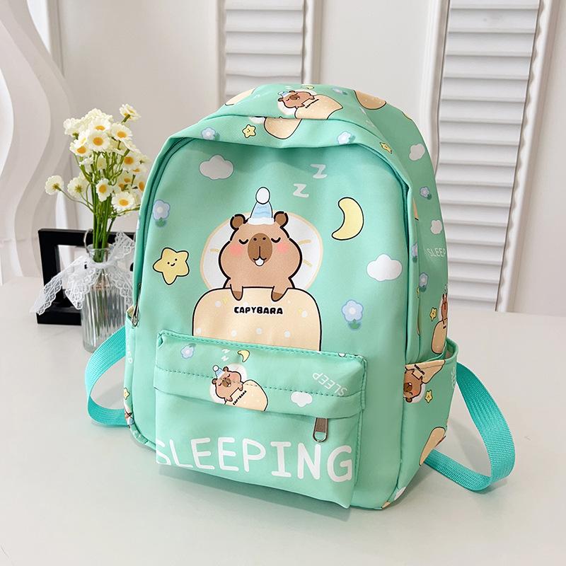 Fashion temperament Trend backpack Junior high school primary school schoolbag Large capacity decompression backpack Cartoon cute student bag