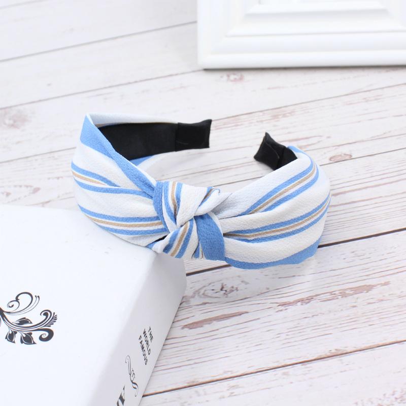 Fabric headband female Yiwu headdress jewelry autumn and winter feeling wide edge versatile high skull top headband hairpin