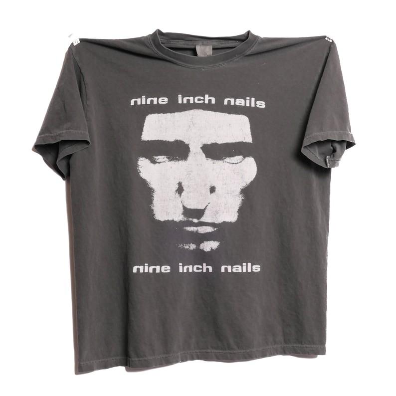 

Nine Inch Nails NIN Downward Spiral Band Tee Post Metal Reprint Unisex T-Shirt XL