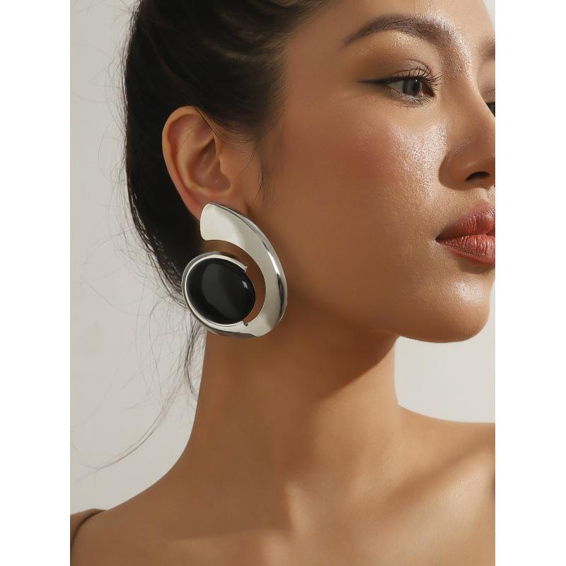 Turquoise Trendy Statement Earrings: Unique Summer Design for a Bold Look.