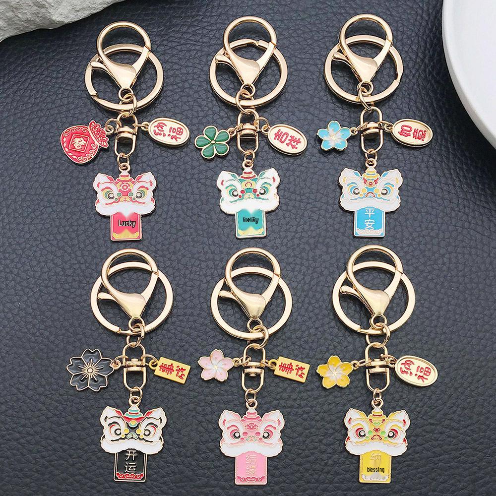 Six-Color Oil Drip Cartoon Chinese Style Keychain: Four-Leaf Clover, Cherry Blossom, Lion Pendant for Backpack