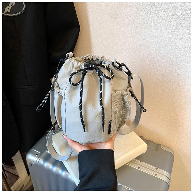 Canvas-Tasche Damen 2025 neue trendige Marke Handy-Tasche Freizeit Sport Reise Umhängetasche kleine Eimertasche