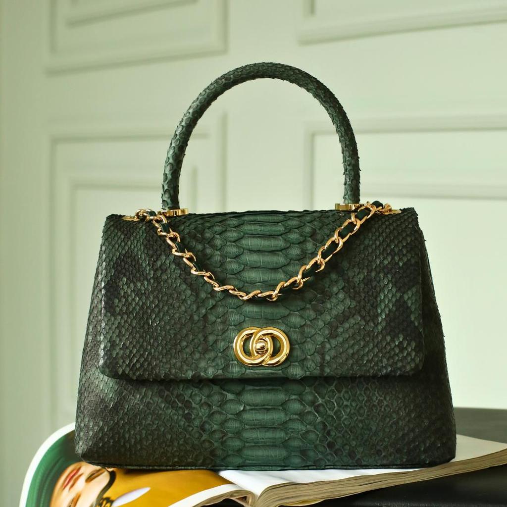 Moteriškos natūralios odos riboto leidimo krepšio modelis