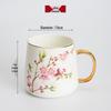 Qianxing Ceramic Plum Blossom Mug with Gold Handle