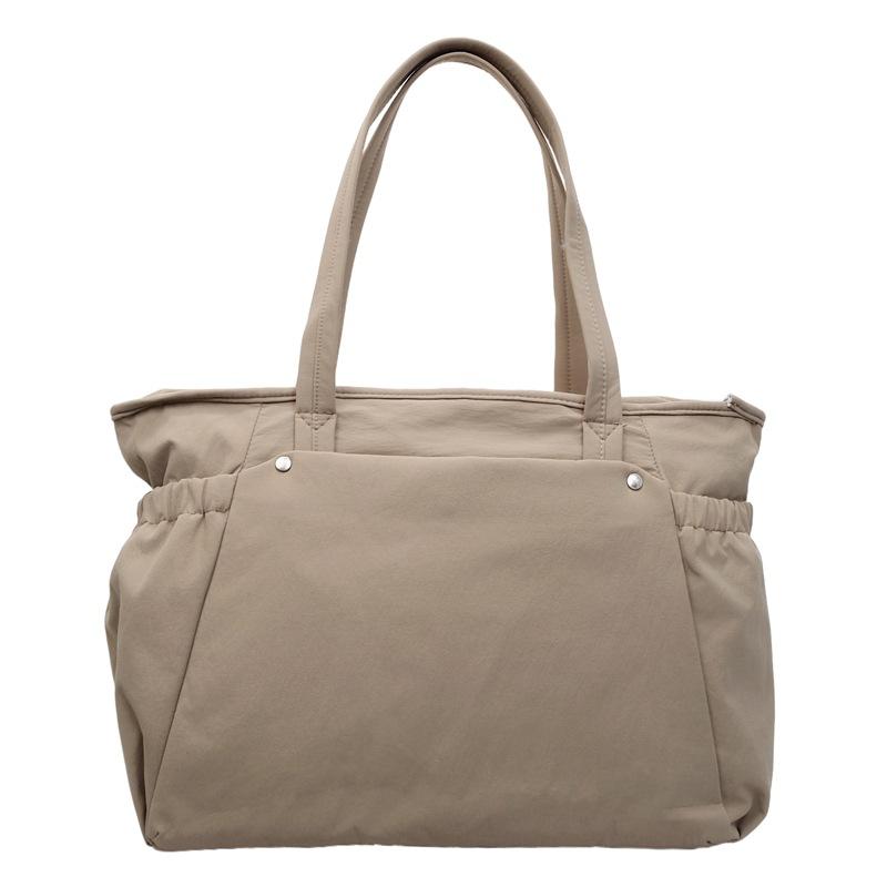 New high-value solid-color handbag tote bag women's casual simple and light commuting large-capacity messenger bag