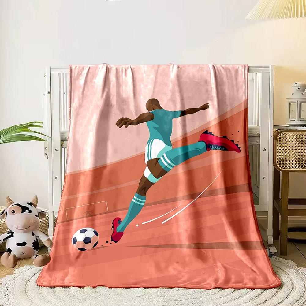 

A soccer player in teal kicks a ball towards a goal in a stylized design. for all seasons blanket lunch break throw gift 80cm x 120cm