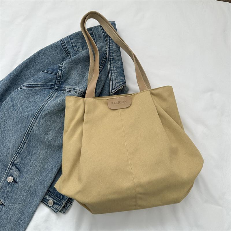 

Trendy Large Capacity Canvas Tote Bag For Women Ideal For Class And Casual Outings With Soft Structure хакі
