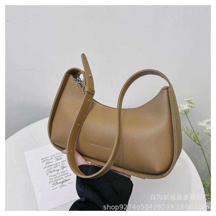 

French light luxury underarm small bag women s 2025 new trendy fashion explosive shoulder bag niche design commuter bag коричневый