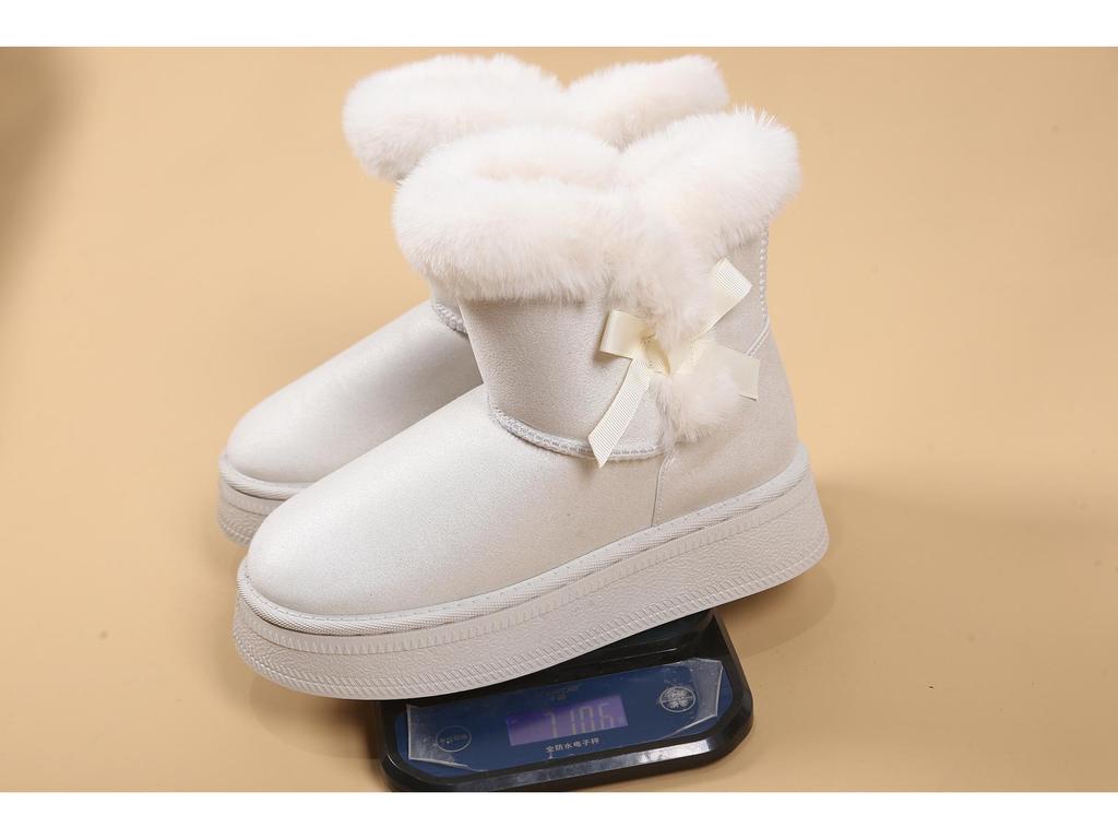 Damen Übergröße Pelzige Winterstiefel: 2025 Lässige Baumwolle aus einem Stück mit dicker Sohle und Schmetterlingsdetail