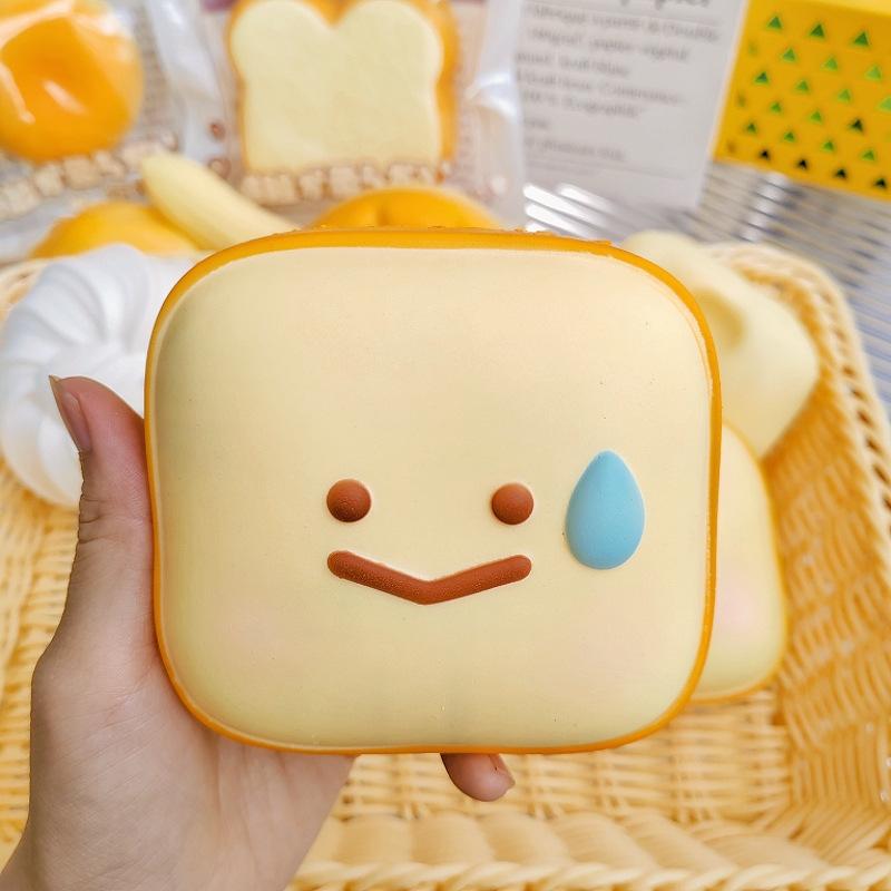 Simulated bread soft and slow-rebounding toy stress relief gadget, "Squeezzy Joy", a cute stress-reducing toy.