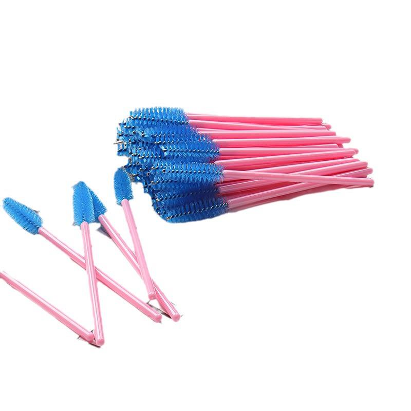 50-Pack Disposable Eyelash Brushes - Portable Pink-Handled Makeup Tool for Eyebrow and Eyelash Application.