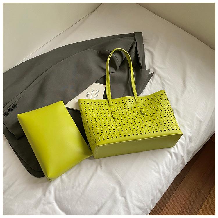 2025 spring and summer new niche high-end hollow tote bag large-capacity temperament commuting single shoulder child and mother bag