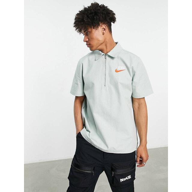 

Oversize-футболка Nike Trend из тканого материала с молнией до половины длины из морской пены