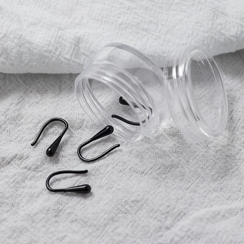 1 Box Contains About 12pcs of Hypoallergenic Ear Studs, Made of Soft Plastic Material. They Feature Drop-shaped and Transparent Hook Earrings