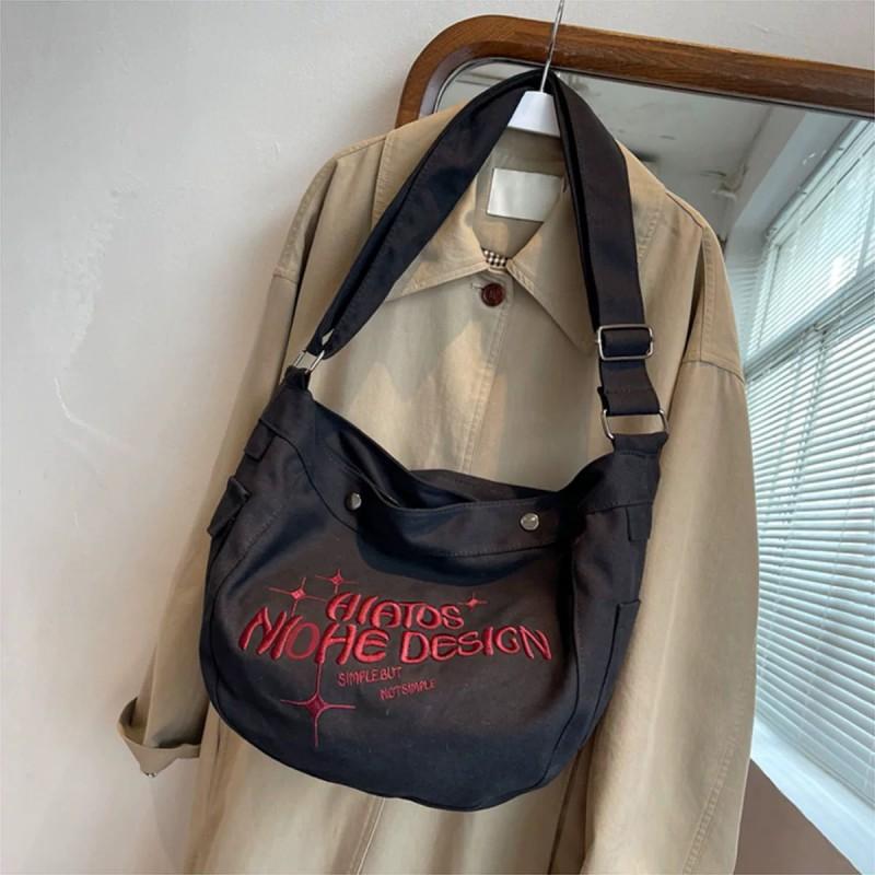 

Niche Design Canvas Bag Female Japanese Ins College Students Class Shoulder Art Cross-body Embroidery Tote чорний