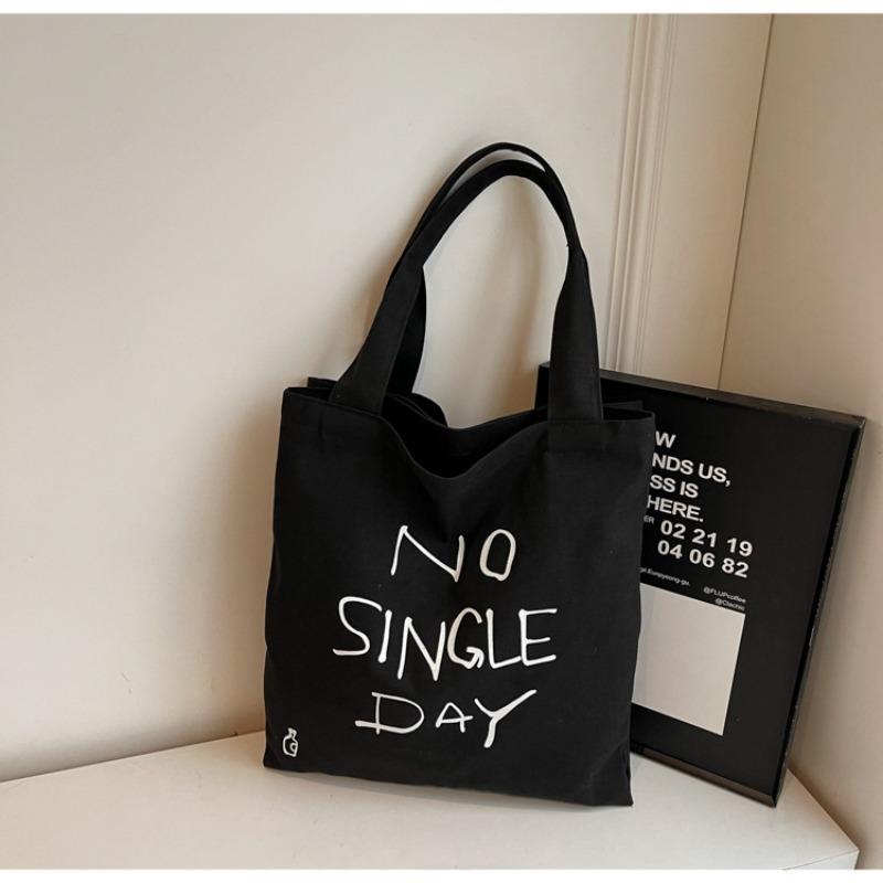 

Casual large-capacity canvas bag women s new commuter versatile shoulder bag college student class bag tote bag чёрный