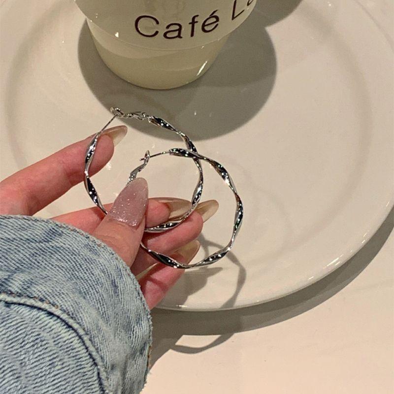 Преувеличенные серебряные вращающиеся серьги, взрывные уникальные витые большие серьги, чувство дизайна, серьги премиум-класса