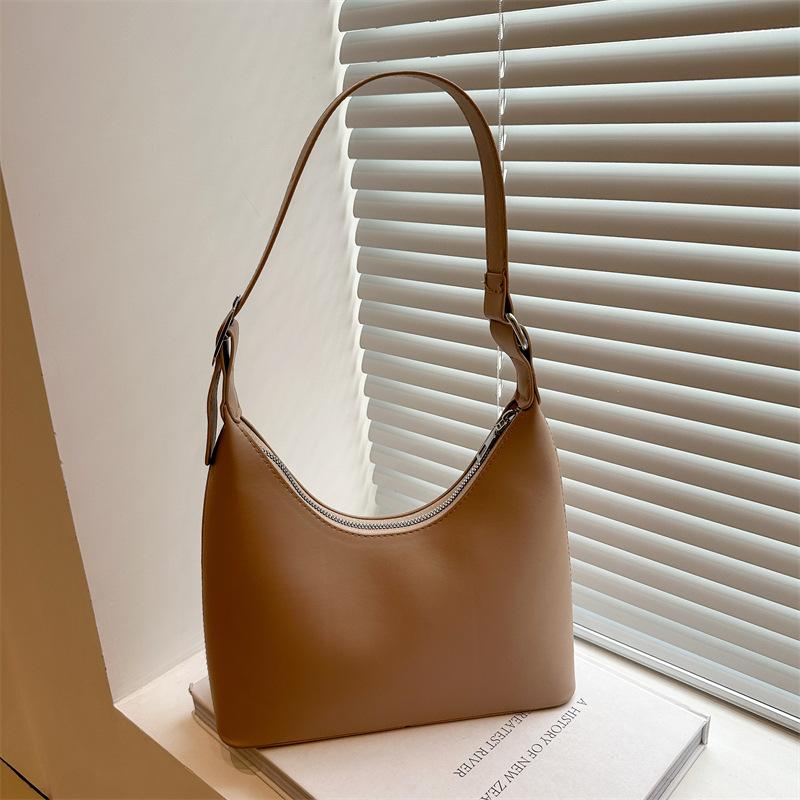 

Light luxury simple underarm bag women s 2025 new trendy high-end texture niche versatile commuter shoulder handbag хаки