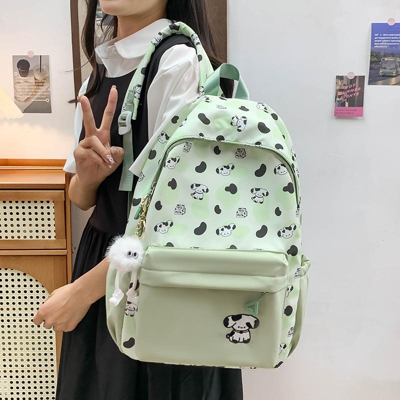 

Lightweight casual backpack small fresh simple go out cartoon dog schoolbag female student cute large capacity backpack single bag зелений