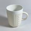 Taza acogedora de hilo de lana y cerámica tejida