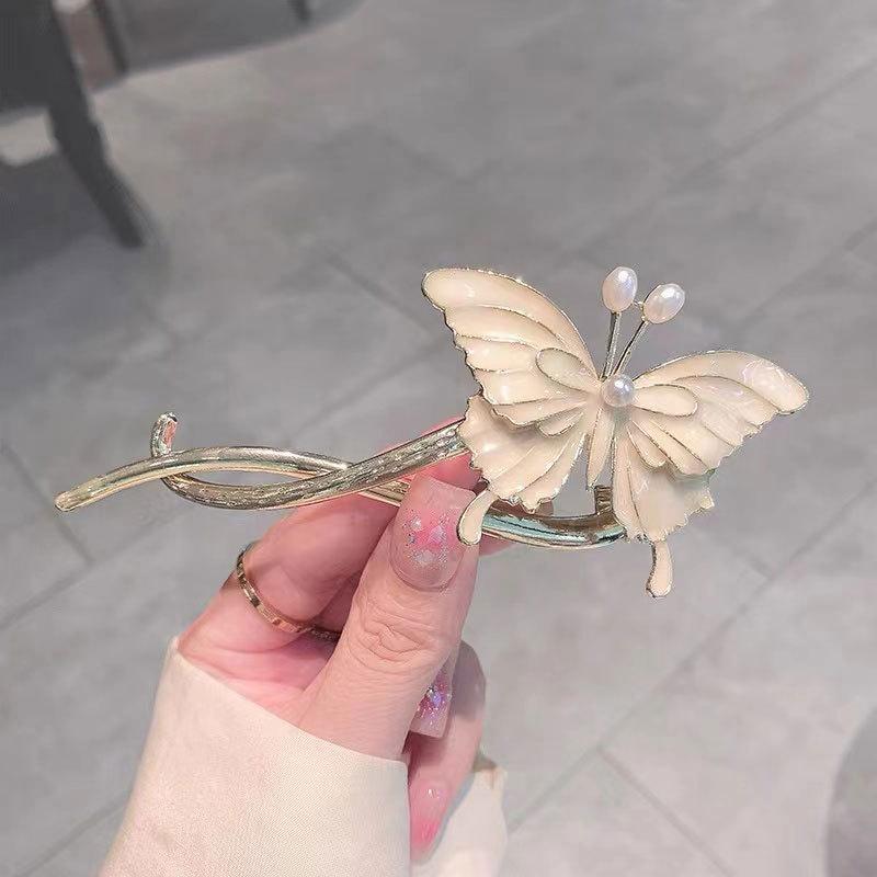 Factory direct fashion flower pearl twist clip elegant hairpin Internet celebrity head spring clip