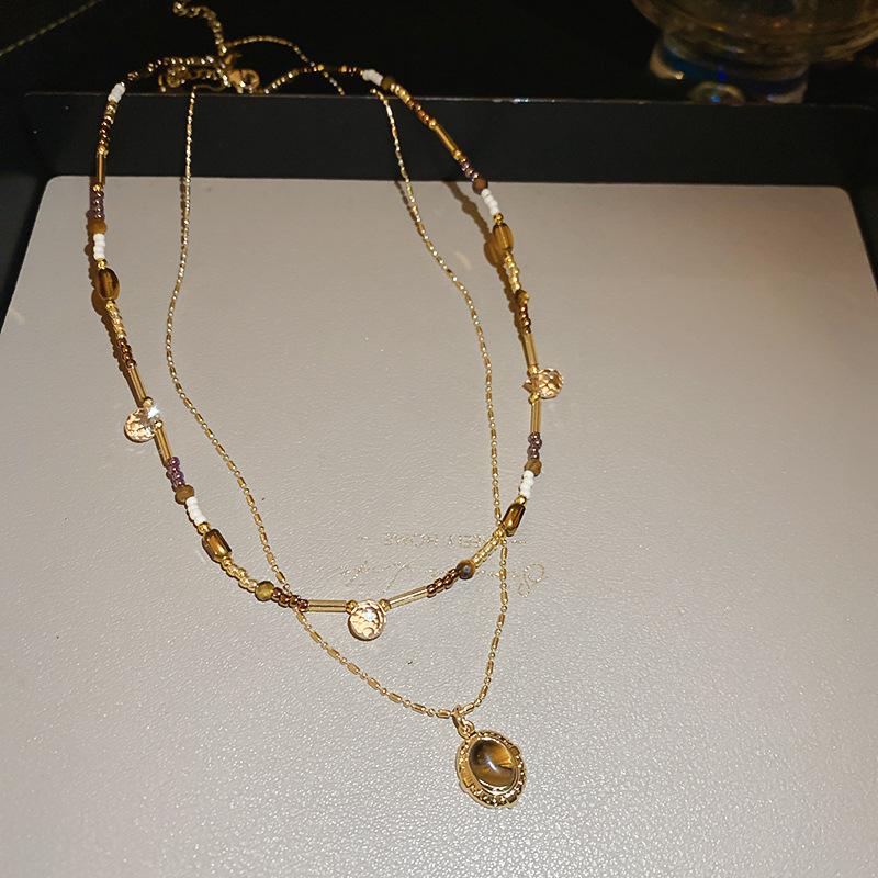 European and American retro coffee color tiger's eye stone beaded pearl necklace light luxury niche collarbone chain temperament advanced sense