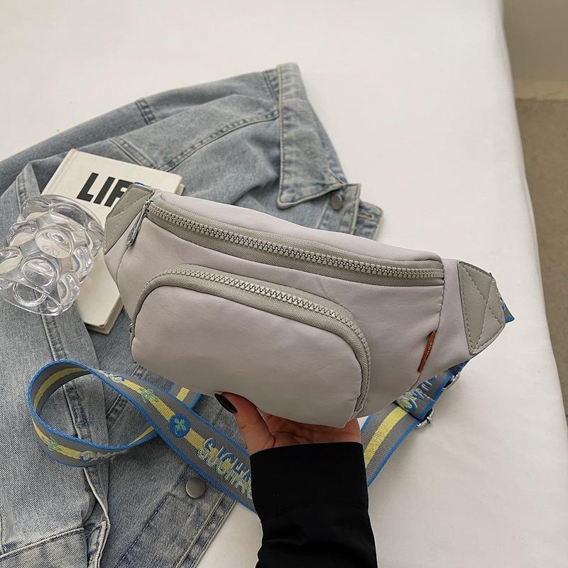 New women's breast bag sports key mobile phone storage bag fashion women's motorcycle solid color fanny pack
