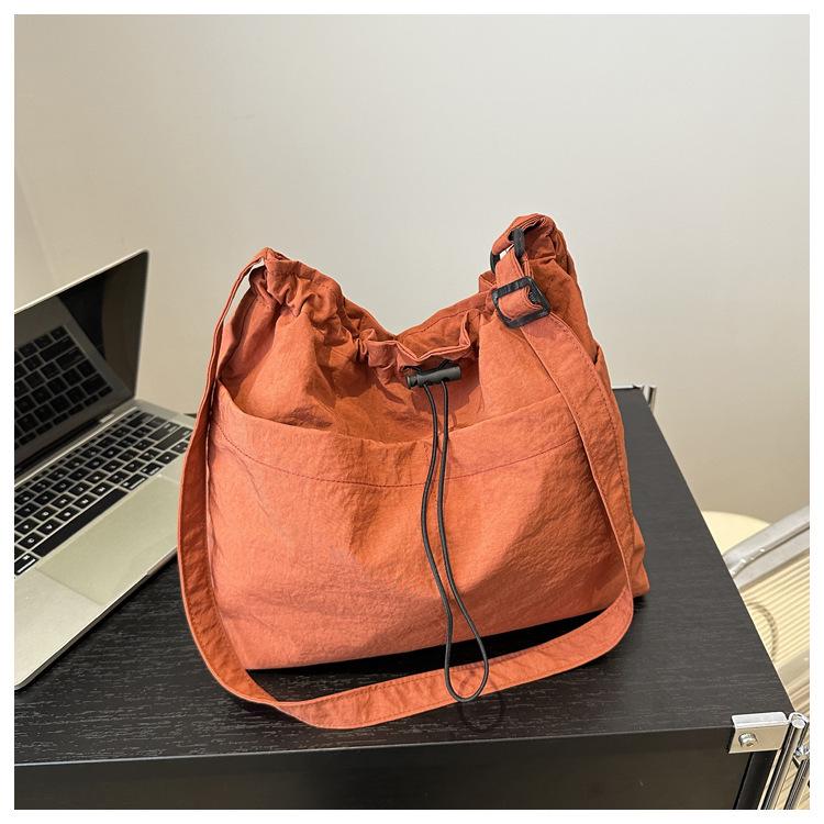

Women s Large Capacity Waterproof Nylon Drawstring Shoulder and Crossbody Bucket Bag, 2025 Edition