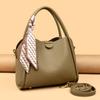 This Bucket Bag Is A Simple and Fashionable Urban Design with A Lychee Pattern and A Silk Scarf. It Is A Hand-held Shoulder Bag