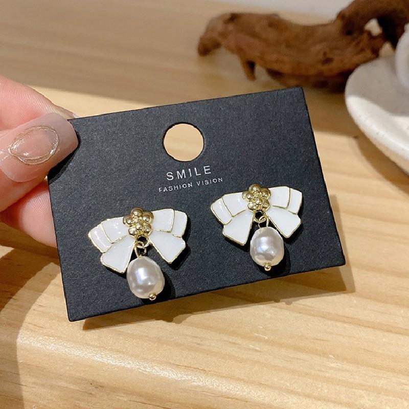 

Новые модные черные эмалевые серьги-капли с бантом для женщин, элегантные серьги-подвески с имитацией жемчуга, ювелирные изделия для свадебной вечеринки, подарок белый