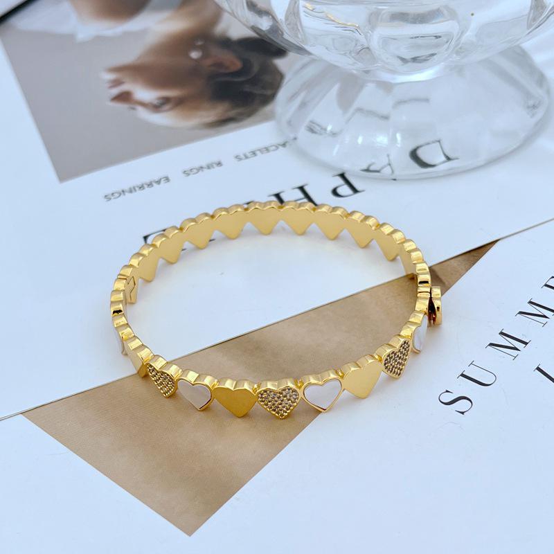 

Exquisite Heart-Shaped Metal Bangle with Natural Shell & Zircon Inlay